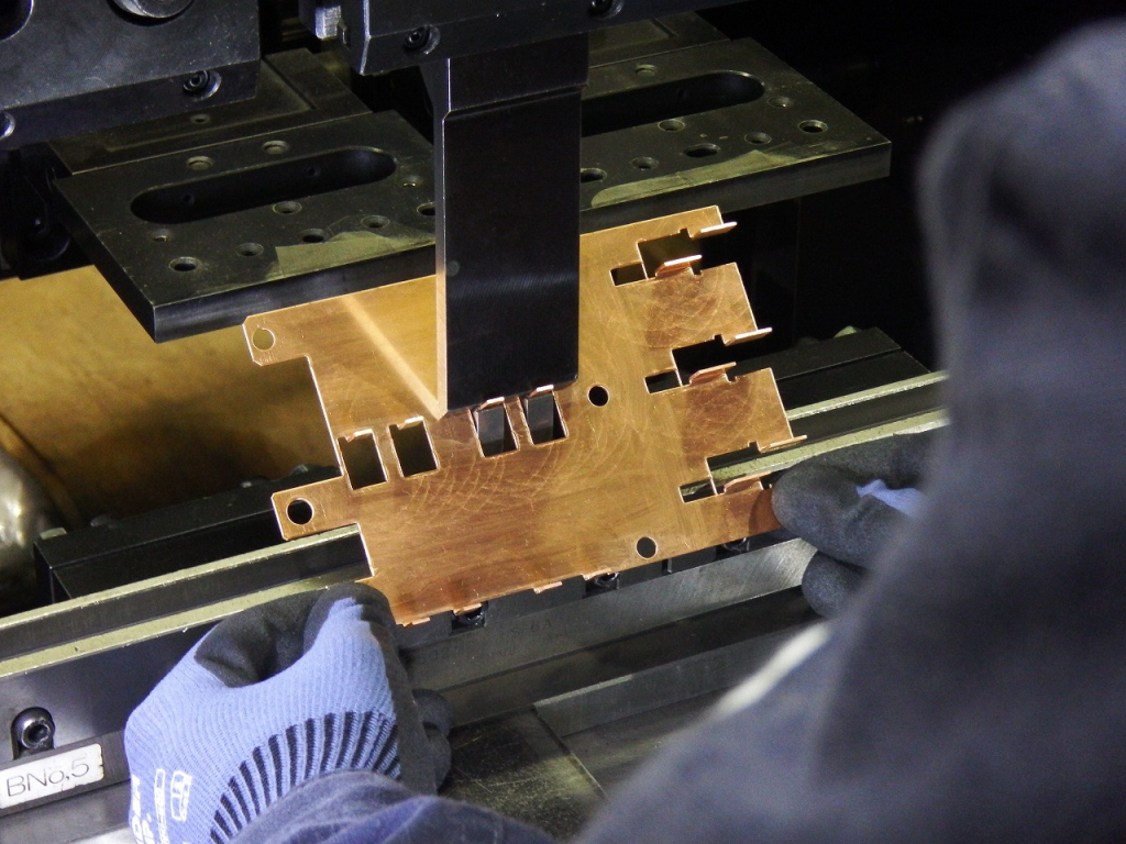 CNC press brake machine bending sheet metal for custom industrial components
