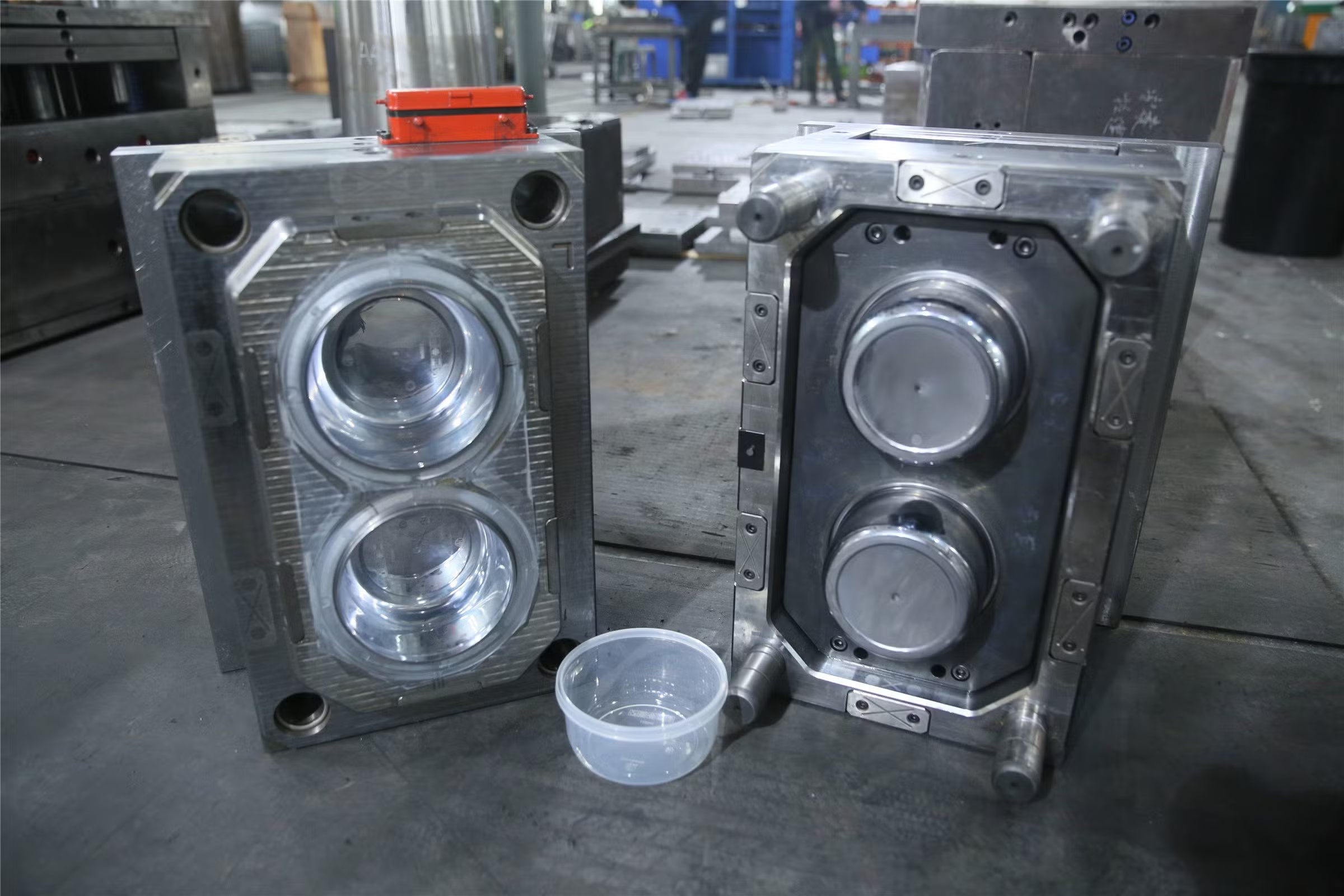 Blow molding process producing transparent PET plastic bottles in factory production line