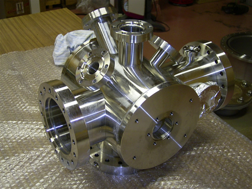 Ultra-high vacuum chamber made from stainless steel with complex geometry machined using multi-axis CNC technology