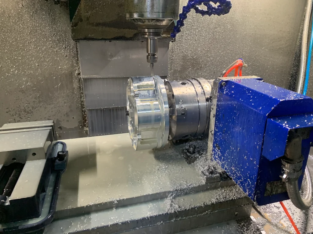 High-precision 4-axis CNC milling machine using rotary indexer for complex aluminum parts machining multi-side milling aerospace automotive and industrial manufacturing applications