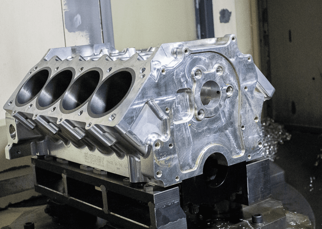 5-axis CNC machining of billet aluminum V8 engine block for high-performance automotive and racing applications with tight tolerance manufacturing