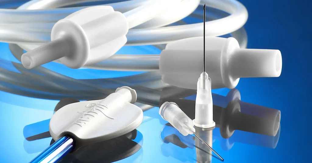 Custom medical device insert molding and overmolding components including luer connectors needle hubs medical tubing fittings and sensor clips — precision medical grade injection mold manufacturing for disposable and reusable healthcare device OEM production