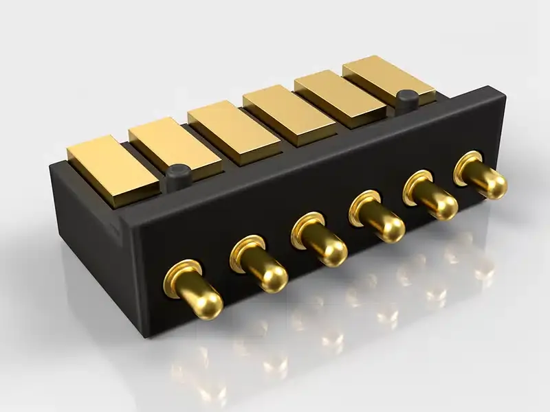 Metal insert molding 6-pin pogo pin connector with gold-plated brass spring-loaded contacts and black engineering plastic housing, precision metal insert molding parts for wearable device charging interface and consumer electronics connector manufacturing service