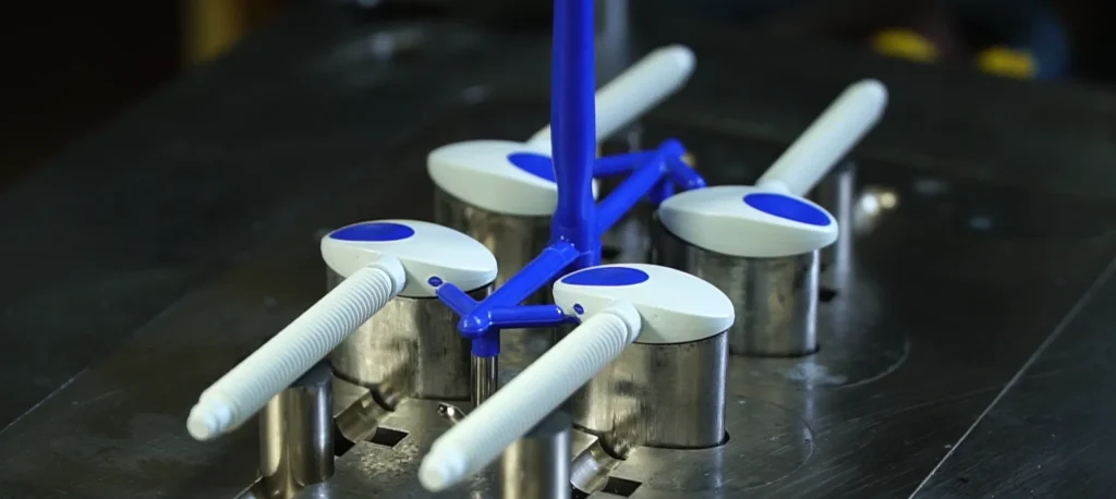 Precision overmolding services featuring multi-cavity overmold tooling, soft-touch TPE overmolding, two-shot injection molding, and custom multi-material plastic part manufacturing for consumer electronics, medical devices, and industrial products.