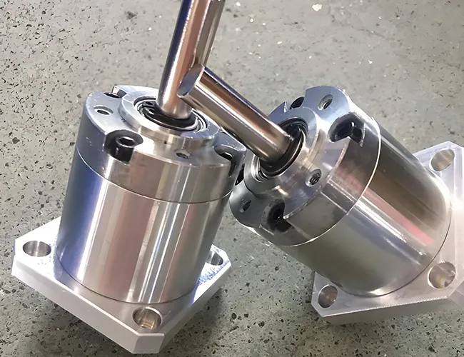 CNC precision machined stainless steel pneumatic cylinder actuator with flange base mount and O-ring seal grooves — custom industrial automation robot components manufactured to tight tolerances